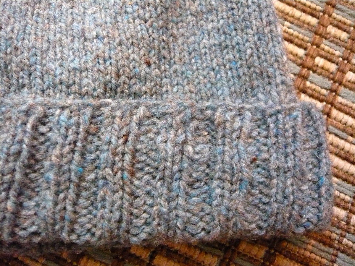 A hand-knitted wool hat with a ribbed brim after blocking