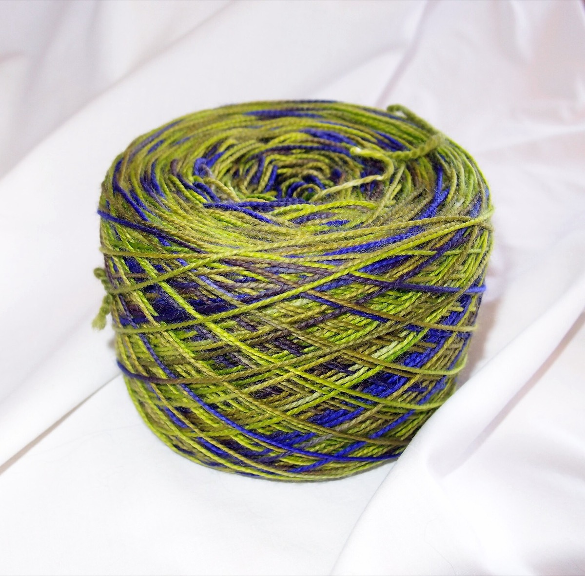 A cake of yarn wound from a skein